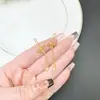 Brincos de Ouro Vietnamita Transfronteiriços, Gancho de Orelha com Franja de Flor de Trevo Vazada Estilo Étnico, Joias Femininas de Cobre Banhado a Ouro Que Não Desbotam por Muito Tempo