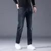Jeans Stretch Slim Fit Reto Tendência Estilo Americano Outono 2026 Calça de Nove Pontos de Comprimento Estendido