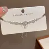 Diseño de moda nicho pulsera de lazo de diamantes llena de temperamento femenino exquisita Joker super brillante joyería de alta calidad al por mayor