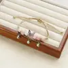 Jingdezhen pequeño fresco moda dulce mariposa tejido a mano pulsera de cerámica joyería al por mayor pulsera para novias