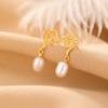 Pendientes Xiangyun huecos con filamento retro de estilo chino con perla de agua dulce bañada en oro de plata esterlina S925 de One Deer.