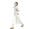 Vestido blanco de cuello francés para mujer, nuevo de verano 2026, casual, entallado en la cintura, adelgazante, versátil, largo, con un aire elegante