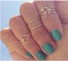 Moda europea y americana nueva joyería corazón de melocotón forma de corazón diamante hoja conjunto de 4 piezas anillo traje anillo de articulación femenino venta al por mayor