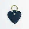 Llavero metálico anti-pérdida simple y versátil, llavero con forma de corazón de cuero PU, colgante para bolsa de regalo DIY, en stock de fábrica