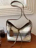Bolso de hombro a rayas transfronterizo, bolso cruzado de color block moderno y a la moda, versátil para el uso diario casual y para ir al trabajo, bolso de axila 206 nuevo