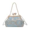 Nuevo bolso cheongsam de estilo chino bordado para mujer, bolso bandolera portátil retro de estilo chino, bolso de noche con perlas a juego.