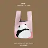 Bolsa de mão de tricô de alta qualidade com retenção automática, blocos de cores retrô, alça de pulso, versão coreana, bolsa de gato, bolsa versátil para mulheres