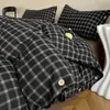 Nuevo conjunto de cuatro piezas de algodón y lino estilo botón simple de lujo ligero, estilo minimalista de Instagram, conjunto de tres piezas de hilo de rizo de algodón puro para ventas transfronterizas