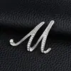Temperamento de comercio exterior europeo y americano 26 broches de letras inglesas femenina diamante personalidad Joker moda corsage pin masculino accesorios