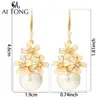Las Joyas Aitong Están Diseñadas con un Sentido de Lujo Ligero y una Sensación de Alta Gama, Presentando Deslumbrantes Pendientes de Flor de Nicho, Pendientes de Perla con Borlas