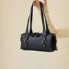 Bolso de axila retro de nicho para mujer, nuevo bolso de hombro de moda 2026 para ir al trabajo, bolso de mano versátil y elegante al por mayor