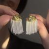 Pendientes de borla irregulares dorados y plateados pendientes de diseño inteligente pendientes de nicho femenino de alta calidad pendientes de lujo ligero pendientes de moda