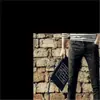 Jeans blancos puros estilo celebridad para hombre, elásticos, versión coreana, corte slim, corte recto, business casual, pantalones de alta gama para hombres de mediana edad