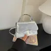 Bolso de mujer vintage 2026 modelo nuevo, color liso, texturizado, moderno, simple, diseño de nicho, bolso de hombro, bolso casual para mujer trabajadora