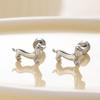 Pendientes Henson de titanio y acero con forma de oreja, con forma de cachorro, con rosca y nicho.