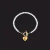 Pulseira Cruzada Retrô Coração Vazado com Pérolas Imitação Letra Inglesa para Mulheres Fivela Ot Pulseira de Contas Pulseira com Letra Dropshipping