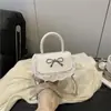 Fresco e Doce 2026 Outono Novo Estilo Laço Elegante Versátil Acabamento em Renda Ombro Único Transversal Bolsa de Mão