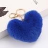 Llavero de bola de pelo de amor arcoíris corazón de durazno felpa accesorios para coche leopardo pareja colgante de corazón fabricantes mayoreo
