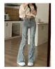 Pantalones vaqueros de estilo retro americano para mujer con abertura y amarre, modelo fino de verano 2026, de cintura alta, corte ajustado, dobladillo deshilachado, acampanados