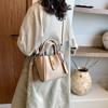 Bolso Versátil para Viajes Transfronterizos para Mujer 2026 Nuevo Bolso Cubo de Moda Retro Textura de Alta Calidad Bolso Cruzado