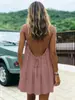 2026 E-commerce transfronterizo europeo y americano Amazon vestido mini plisado de seda de hielo color liso sin espalda de tiras, vestido de vacaciones en la playa para mujer