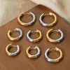 Pendientes redondos de dos colores de acero de titanio, estilo nuevo francés versátil de alta calidad, estilo simple y fresco, joyería de nicho para mujer