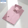 Camisa de hombre de manga corta estilo business casual en tejido Oxford lavado con enzimas, camisa con cuello lavado con enzimas para el trabajo de campo y para ir al trabajo