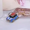 Llavero Creativo de Moda Europea y Americana para Coche Colgante Creativo de Goteo de Aceite para Bolso Joyería Fabricante de Llaveros de Metal
