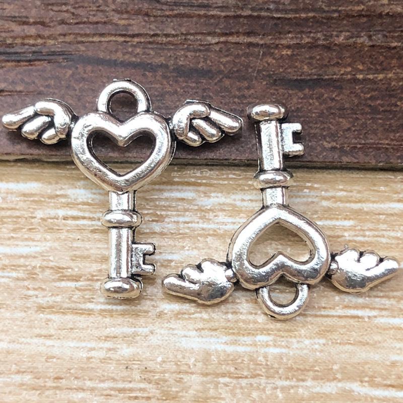 11409-古银爱心翅膀钥匙15x14mm-0.6g 梦-.