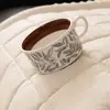 Suministro exclusivo transfronterizo de cojines de sofá de felpa, engrosados para otoño e invierno, con un diseño antideslizante de una sola pieza y funda de sofá resistente a los arañazos de gato