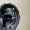 Colección de Clavos para Hélice de Acero de Titanio de Lujo Ligero Elegante de Nicho Pendientes Versátiles Incrustados con Circonita para Mujeres Exquisitos Llenos de Diamantes