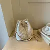 Bolsa transversal pequena com padrão de diamante 2026 novo modelo, bolsa tipo saco com cordão, bolsa saco redonda de luxo leve, bolsa de ombro, bolsa transversal