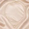 Collar con colgante circular de doble capa simple para mujer, accesorios de temperamento de perla que combinan con todo, joyería transfronteriza europea y americana de moda