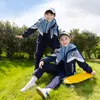 Uniforme escolar para estudiantes de primaria y secundaria en otoño e invierno con forro de terciopelo conjunto de tres piezas ropa deportiva infantil ropa de clase jardín de infantes Ropa de jardín