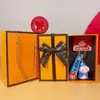 2025 Año de la Serpiente Tendencia Nacional Creativo Pequeña Serpiente de la Suerte Llavero Caja de Regalo Lindo Bolso Llavero Colgante Venta al por Mayor Pequeños Regalos