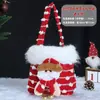 Saco de maçã de Natal transfronteiriço Saco de presente de flanela com desenho animado bronzeado com laço Sacola de presente de doces para crianças