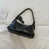 Bolsa de gran capacidad Shuai Mi Jia otoño 2026 nuevo nicho retro bandolera cruzada para clase y desplazamientos bolsa tipo empanadilla