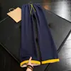 Calça de moletom atlética color block retrô americana, unissex, coleção outono/inverno, respirável, calça casual de perna reta, calça de perna curva cleanfit