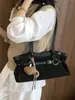 Bolso de mano vintage de alta gama transfronterizo para mujer, nuevo modelo otoño 2026, bolso versátil casual para hombro y axila para el trabajo