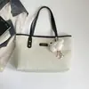 Bolso de mano de moda transfronterizo, bolso tote, nuevo bolso de hombro retro minimalista para commuting, bolso de mujer casual de personalidad para distancias cortas
