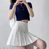 Falda plisada de uniforme JK de cuatro estaciones nueva de venta al por mayor + cremallera + botón falda versátil falda corta