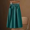 Falda Línea A 2023 nuevo verano para mujer versátil color sólido cintura alta elástica falda línea A casual moda largo medio vuelo amplio