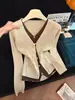 Cárdigan de punto de manga larga con cuello en V estilo francés para mujer, otoño 2026, sofisticado y hermoso, protector solar, estilo suave top A13491