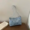 Bolsa de ombro única transversal retrô simples casual elegante da moda versátil com bolinhas grandes de nicho de alto valor verão 2026