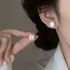 Novedad 2025 Pendientes de Perla Sencillos Versátiles Moda Femenina Elegante Diseño de Nicho Pendientes de Botón de Alta Gama