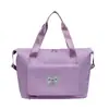 Bolsa deportiva portátil de gran capacidad transfronteriza para fitness, bolsa de viaje diagonal de corta distancia para mujer, bolsa de hombro repelente al agua para yoga, venta al por mayor