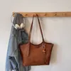 Bolso tote nuevo de otoño 2026, bolsa de gran capacidad para mujer, adecuado para estudiantes universitarios, trabajo y desplazamientos, elegante bolso de hombro