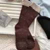 Calcetines de mujer de estilo miu con lunares hasta la mitad de la pantorrilla, calcetines de algodón de otoño con puños de color contrastante, calcetines de niña estilo ballet con lunares hasta la mitad de la pantorrilla
