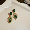 Pendientes de mariposa y flor de circón verde ultrabrillante transfronterizos, sensación de lujo ligero de alta gama, pendientes versátiles con un diseño único
