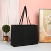 Bolsas de Papel en Stock para Tiendas de Ropa, Bolsos de Mano de Alta Gama Estilo Ins, Bolsas de Regalo para el Día del Niño, Bolsas de Papel Cartulina Blanca con Logo Personalizado